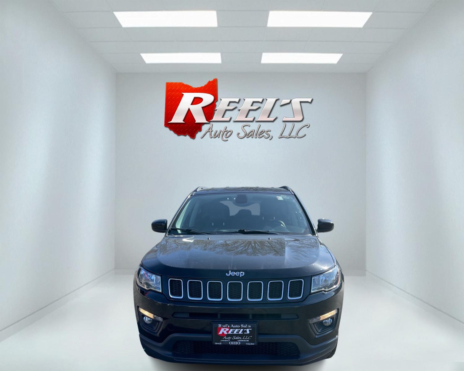 2017 Black /Black Jeep Compass Latitude 4WD (3C4NJDBB9HT) with an 2.4L I4 DOHC 16V engine, 9-Speed Automatic transmission, located at 547 E. Main St., Orwell, OH, 44076, (440) 437-5893, 41.535435, -80.847855 - This 2017 Jeep Compass Latitude 4WD is a capable and well-equipped compact SUV. It features a 2.4L I4 MultiAir engine paired with a 9-speed automatic transmission, delivering a smooth driving experience enhanced by Auto Start/Stop technology. Convenience features include push-button start, remote st - Photo #1